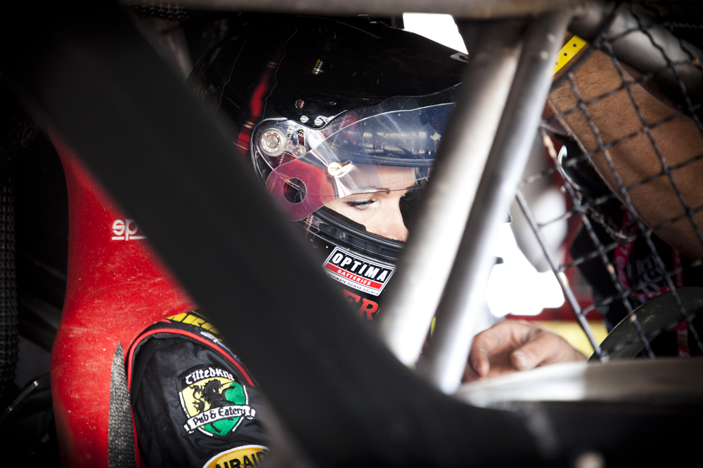 Corry Weller strapped into her race truck